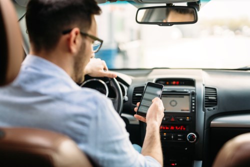 'Distracted driving should be the new drunk driving' says Aviva International CEO