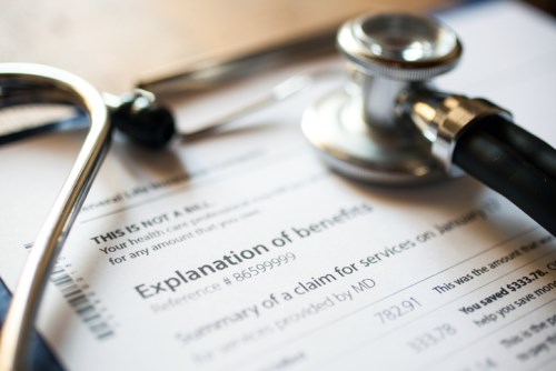 Four pharmacists, doctor charged in $5 million insurance scam