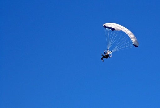 Claims that man attempted to kill wife for insurance by sabotaging parachute