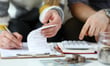Canadians gaining financial ground but inflation bite lingers
