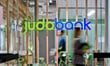 Lender shares fall 40% after profit warning and credit loss update
