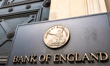 Bank of England lowers base rate amid global trade concerns