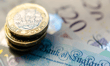 UK economy returns to growth in May, but outlook stays uncertain