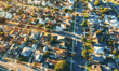 Home prices up annually but monthly gains continue to ease