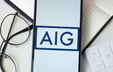 AIG boosts reinsurance, raises tender offer