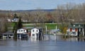Simultaneous floods in Montreal and Edmonton expose structural underinsurance gap as national flood