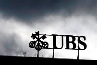 UBS posts largest quarterly profit in almost 3 years, as client outflows slow