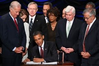 Obama signs controversial financial-reform bill - and the spin begins