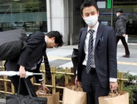 Tokyo rocked, but U.S. financial firms are staying put