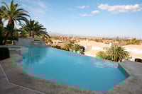 Wealthy turn to auctions as mansions go unsold for years