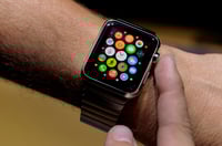 Apple's market cap tops $700 billion, a milestone for U.S. companies