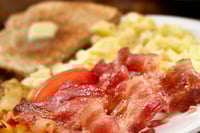 Food is the focus for this financial planner, who meets clients over bacon and eggs