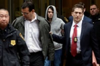Shkreli, CEO reviled for drug price gouging, arrested on securities fraud charges
