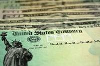 How should clients use their tax refunds?
