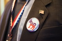 Democratic platform draft includes financial transactions tax, defense of DOL fiduciary rule