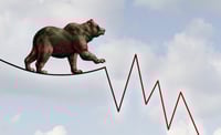 U.S. stocks fall from near record high as dollar rebounds