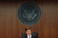 SEC lifts hiring freeze, lowers pay raises
