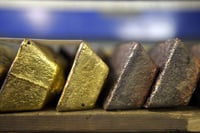 Gold digs in near seven-year high as ETFs swell again