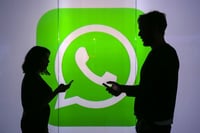 Wall Street firms seen paying historic fine to settle WhatsApp probe