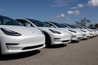 Investors want Musk to focus on Tesla as EV competition grows