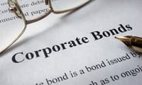 Corporate bond rush tightens global credit spread