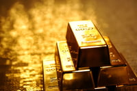 Gold shrinks from new record as investors look ahead to Jackson Hole