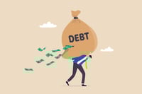 Which is worse, accumulating more debt or not saving enough?
