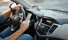 Distracted driving, social inflation weigh on commercial auto insurance – AM Best