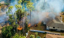Insurers are pricing wildfire risk by the neighborhood, not the house