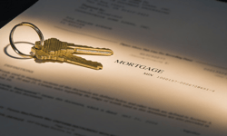 Mortgage rate hike ends decline streak, loan applications slide