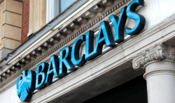 Barclays to curb some lending after huge mortgage-related hit