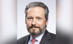 Crawford appoints W. Bruce Swain CEO