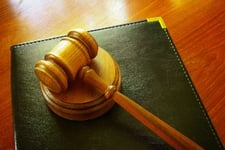 Oregon sues insurer for millions over health plan exit