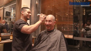 CEO raises $70K with charity head shave