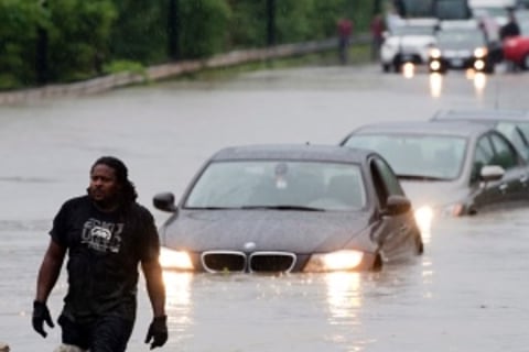Brokers log overtime after record flooding