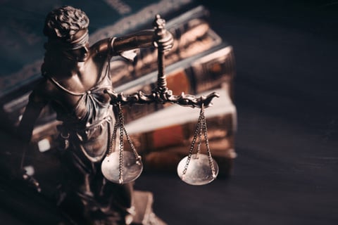 ASIC takes Freedom Insurance director and consultant to court