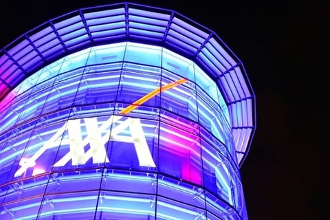 AXA extends fossil fuels policy to XL, accepts huge losses