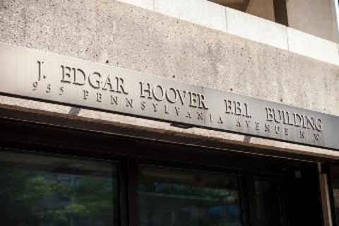 Federal agents raid offices, seize material of former insurance mogul