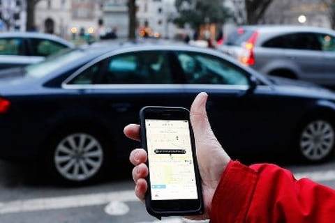 Uber chooses Progressive Insurance for its coverage options