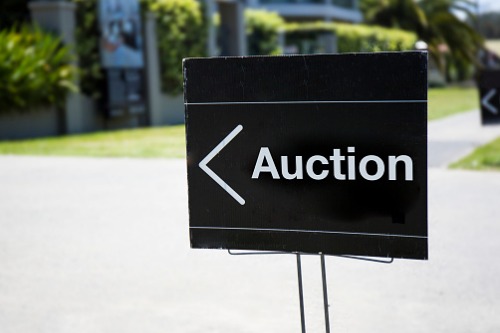 Auction activity slides over weekend