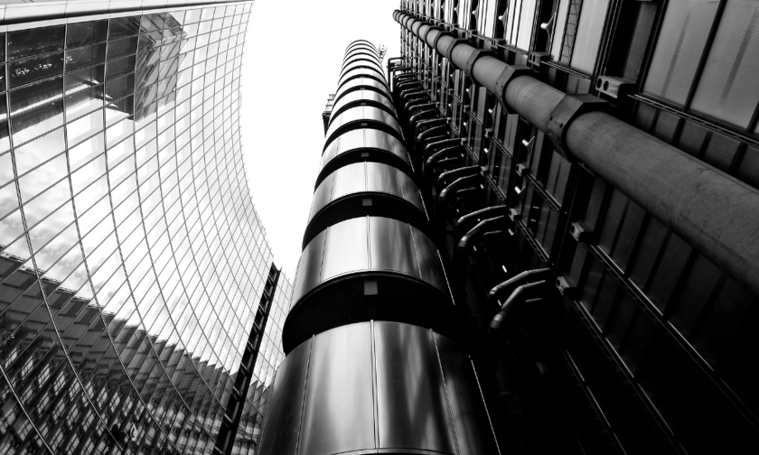 Lloyd's broker charged in bribery case