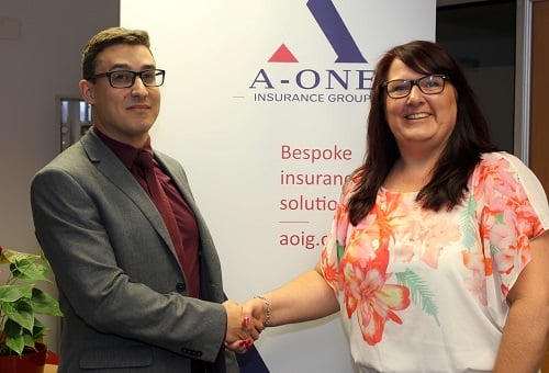 AOIG bolsters head office with double hire