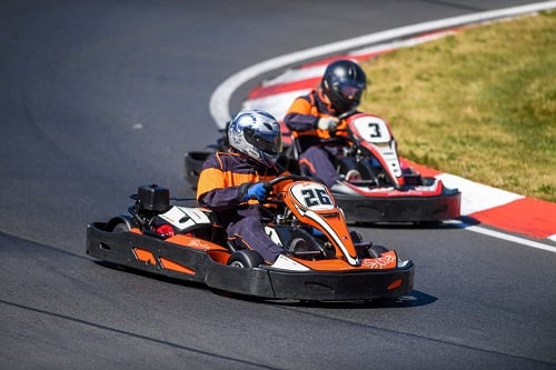 Who got top spot in insurance industry kart race?