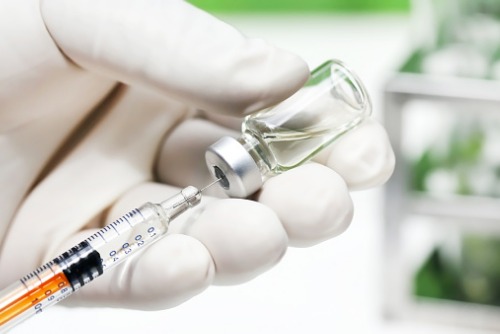 Beijing may require compensation for adverse vaccine reactions