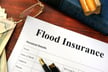 How are rising flood insurance costs impacting policyholders?