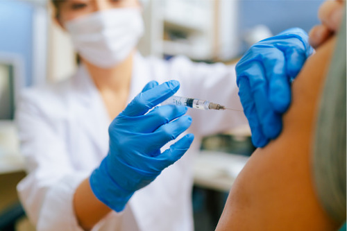 HK regulator "strongly encourages" insurance professionals to get vaccinated