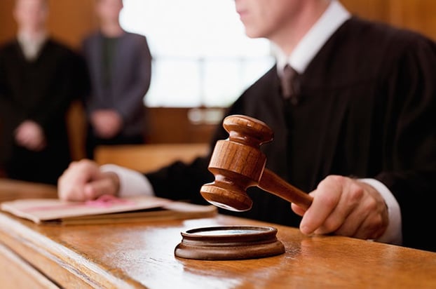 Aetna hit with class action threat