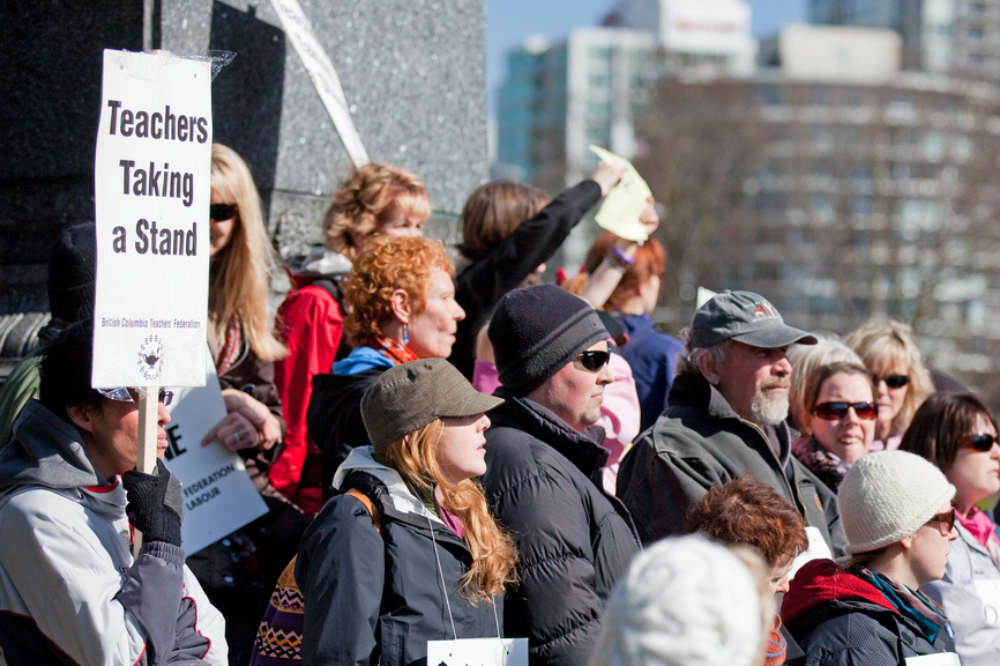 Thousands of NSW teachers walk off the job over high workloads, low pay