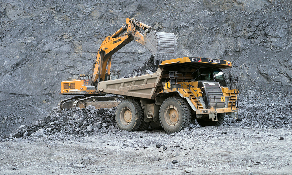 Just cause needed to fire probationary worker but standards lowered in previous arbitrations