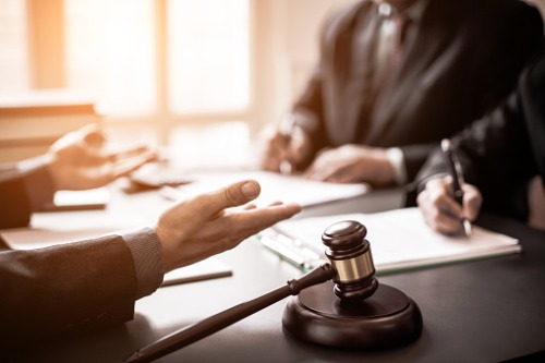 Insurance commissioner accused of trying to solicit bribe from billionaire